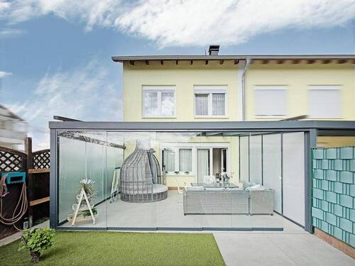 Außenansicht - Gepflegtes Reihenendhaus mit durchdachtem Wohnkomfort in zentraler Lage!