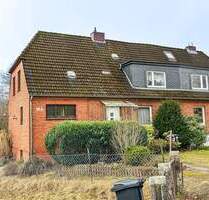 Kiel-Kroog - Doppelhaushälfte mit viel Potential in Sackgassenlage mit großem Grundstück