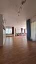Großzügiges Wohnzimmer - Provisionsfrei! Helle und barrierefreie 4-Zimmer-Wohnung mit eigenem Garten in der Südstadt