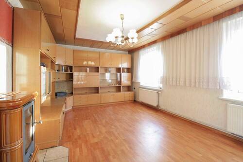 Wohnzimmer mit Kamin EG - 4 Zimmer Einfamilienhaus zum Kaufen in Gartz (Oder)