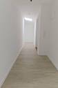 Blick vom Wohnzimmer i.d. Flur - 