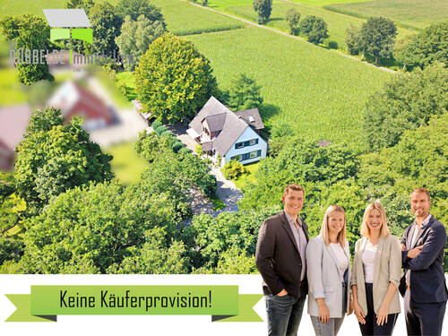 Titelbild - Nah an der Natur und doch dicht an Barßel: Wohnhaus im Grünen mit großem Grundstück!