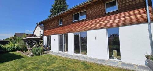 Seitenansicht EFH - Einfamilienhaus mit 156,00 m&sup2; in München zum Kaufen