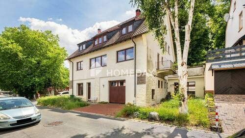 Außenansicht 1 - Charmantes Mehrfamilienhaus mit Ausbaupotenzial - Großzügig, gepflegt und vielseitig nutzbar