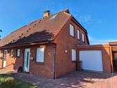 Straßenansicht - 4 Zimmer Mehrfamilienhaus, Wohnhaus zum Kaufen in Wangerland