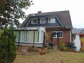 Haus mit Wintergarten und Terrasse Bild 1.jpg - 5 Zimmer Einfamilienhaus in Wolfsburg
