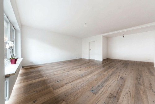 Wohnzimmer leer - 3 Zimmer Terrassenwohnung zum Kaufen in München