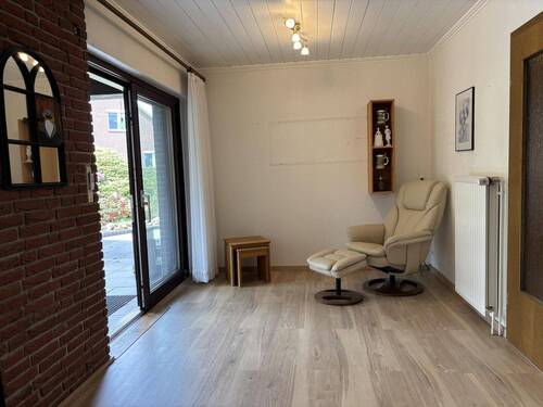 Wohnbereich mit Zugang zur Terrasse - 