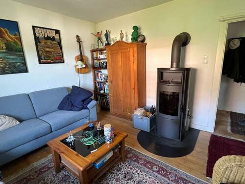 Wohnzimmer mit Kamin 1.OG - 