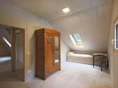 Geräumiges Gästezimmer im Dachgeschoss - 