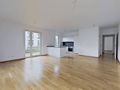 Ansicht I: Wohn- und Esszimmer mit Zugang zur Terrasse - Lichtdurchflutetes Design: Neuwertige 3-Zimmer-Wohnung mit Terrasse, EBK u.v.m.