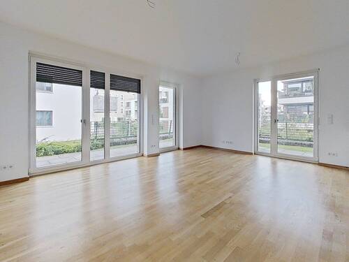 Ansicht II: Wohn- und Esszimmer mit Zugang zur Terrasse - 3 Zimmer Terrassenwohnung zur Miete in Wolfsburg