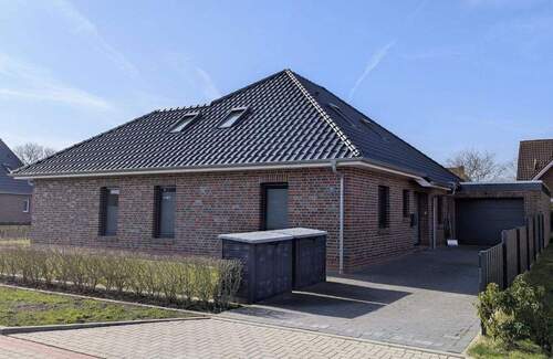 Bild 1 - Zeitlose Eleganz trifft Küstenlage - Exklusiver, energieeffizienter Neubau in Bensersiel