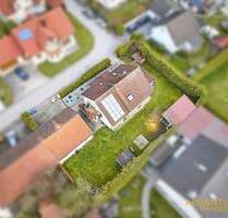 Flexibles Zweifamilienhaus mit großem Grundstück und Nebengebäude in ruhiger Lage von Biburg