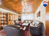 RE/MAX Immobilien DeLux Wohnzimmeransicht 2 - 