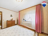 RE/MAX Immobilien DeLux 1. Schlafzimmer 2 - 