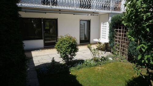 Terrasse EG-Wohnung - 8 Zimmer Doppelhaushälfte in Gilching / Geisenbrunn