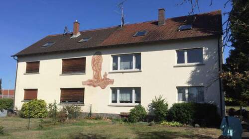 Vorderansicht Doppelhaus - Mehrfamilienhaus mit vielfältigem Potential