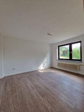 Bild 1 - 2 Zimmer Wohnung mit Gartenabteil + Carportstellplatz zu vermieten