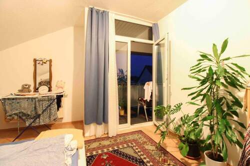 Schlafzimmer mit Balkon - 