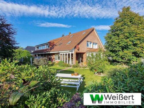 Titelbild - Exklusives Mehrgenerationshaus mit drei Wohneinheiten und 450 m² Wohnfläche auf traumhaftem Grundstück