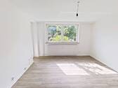 Ansicht I: Wohn- und Esszimmer - Moderne 2-Zimmer-Wohnung mit TERRASSE und EBK