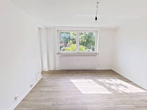 Ansicht I: Wohn- und Esszimmer - Moderne 2-Zimmer-Wohnung mit TERRASSE und EBK