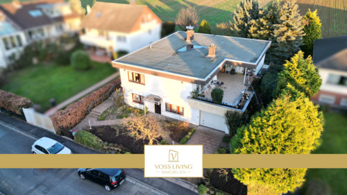 Titelbild_1 - Repräsentativer Bungalow mit Einliegerwohnung, Doppelgarage + großer Terrasse in Toplage von Karben