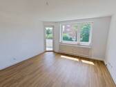 Ansicht I: Wohnzimmer - Familien und Paare aufgepasst: Helle 3-Zimmer-Wohnung mit Balkon in Minden