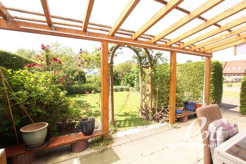 überdachte Terrasse - Doppelhaushälfte mit 120,00 m² in Apen / Augustfehn zum Kaufen