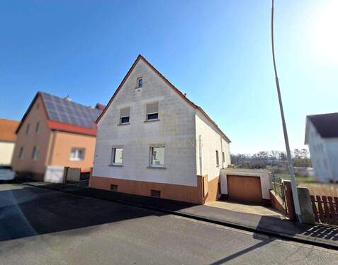 Hausansicht_vorne - 7 Zimmer Einfamilienhaus zum Kaufen in Wöllstadt