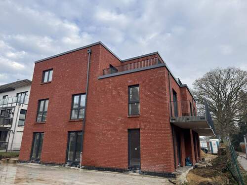 Außenansicht - Neubau Erstbezug 2 – Zimmer Komfort-Wohnungen mit Balkon Terrasse und Fahrstuhl Whg. 2