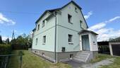 Front- und Seitenansicht - 4 Zimmer Einfamilienhaus zum Kaufen in Leutersdorf