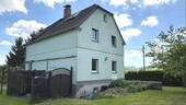 Seiten- und Rückansicht - Einfamilienhaus mit 100,00 m&sup2; in Leutersdorf zum Kaufen