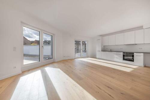 Essbereich und Küche Musterwohnung - Erstbezug: Moderne Neubauwohnung mit Südbalkon & bodentiefen Fenstern