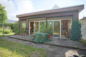 Seitenansicht mit Terrasse - Einfamilienhaus mit 133,00 m&sup2; in Bremerhaven zum Kaufen