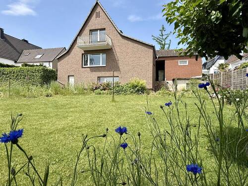 Rückansicht mit Garten - Einfamilienhaus mit 139,90 m&sup2; in Fröndenberg/Ruhr zum Kaufen