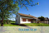 Cover Logo - Ruhe, Grünblick & Entwicklungsmöglichkeiten - Einfamilienhaus mit schönem Grundstück in Holzheim