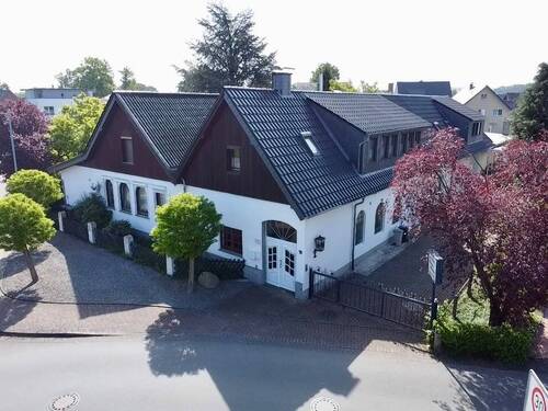 Straßenansicht - Multifunktionales Wohn- und Gewerbeobjekt mit Ausbau- & Entwicklungspotenzial in Löhne!