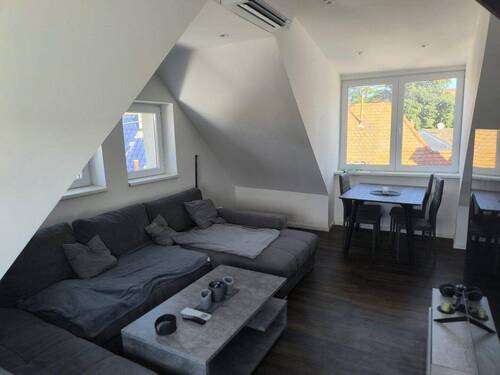 Wohnzimmer mit Essbereich - 2 Zimmer Etagenwohnung in Wiesloch