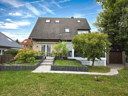 Gartenansicht - Freistehendes Einfamilienhaus mit Wintergarten in ruhiger Lage