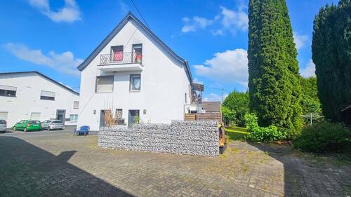 Seitenansicht Haus Nr. 5a - Mehrfamilienhaus, Wohnhaus mit 434,00 m² in Windeck / Imhausen zum Kaufen