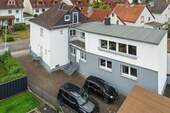 Seitenansicht - 7 Zimmer Mehrfamilienhaus, Wohnhaus zum Kaufen in Rödermark