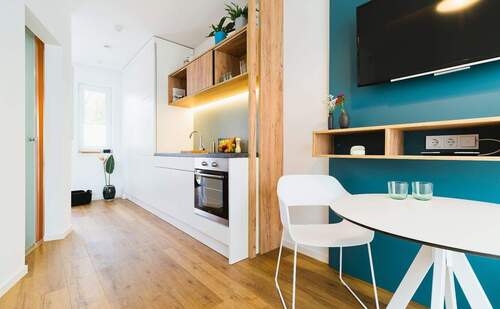 APARTMENT - Smartes Wohnen - Möblierte Erdgeschosseinheit mit Terrasse, Garten und TG-Stellplatz