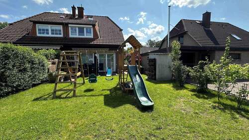 Garten - Hinteransicht - 5 Zimmer Doppelhaushälfte zum Kaufen in Uetersen