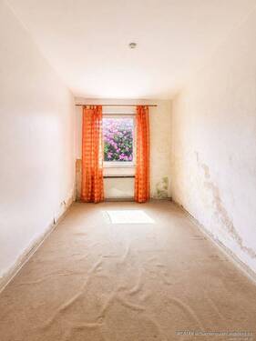 Schlafzimmer 1 Einliegerwohnung Souterrain - 