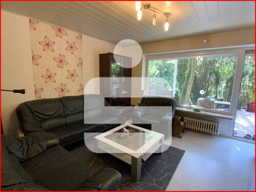 Wohnzimmer - Erdgeschosswohnung mit großem Gemeinschaftsgarten