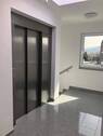 Treppenhaus / Aufzug - 