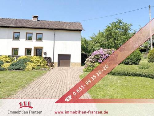 Titelbild - Gepflegte Doppelhaushälfte mit Terrasse, schönem Garten, Keller, großer Garage und viel Stauraum