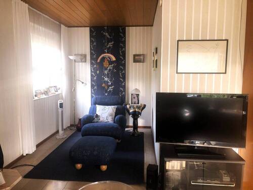 Kaminecke im Wohnzimmer - 6 Zimmer Einfamilienhaus in Lehre